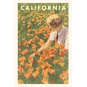 The Vintage Journal Woman sitting in Field of California Poppies
